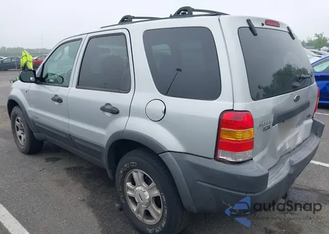 2002 Ford Escape Xlt z USA, uszkodzony, nr VIN 1FMYU04192KC73886